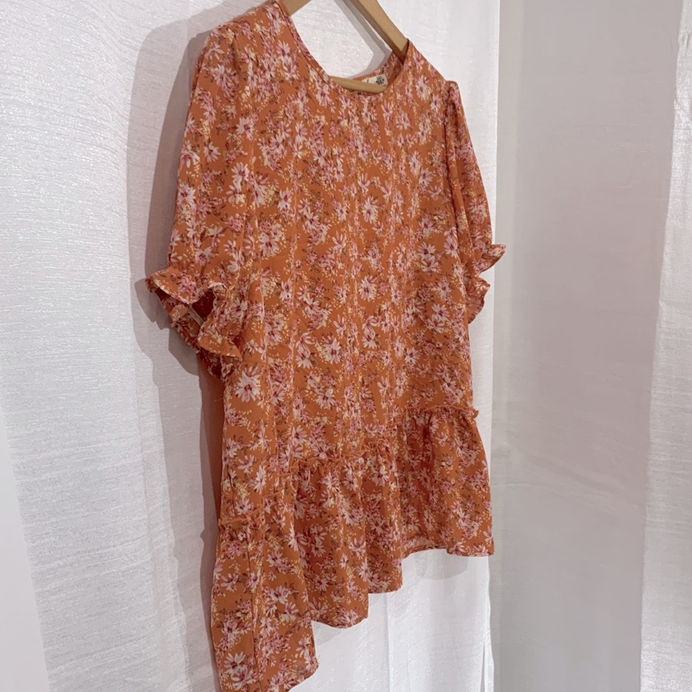 Orange floral blouse